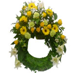  This wreath with white lilies, yellow gerberas, yellow roses, green carnations ...