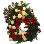  This wreath with white roses red gerberas and lilies. Sends so many beautiful m...