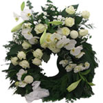  This wreath with white orchids, lilies and  roses.(Size small 50cm)....