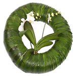 This austere and symbolic funeral wreath has an intricate structure of overlappi...