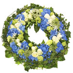 Funeral wreath, this classy and peaceful funeral wreath is a beautiful mix of wh...
