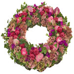 Cherish an outstanding human being. This traditional colourful funeral wreath wi...