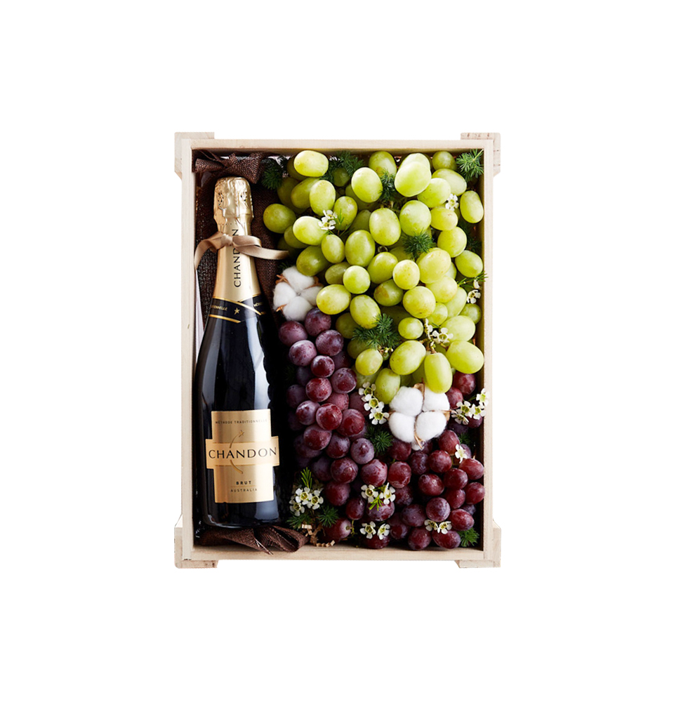 Sending a wine gift box with seasonal fruits shows...