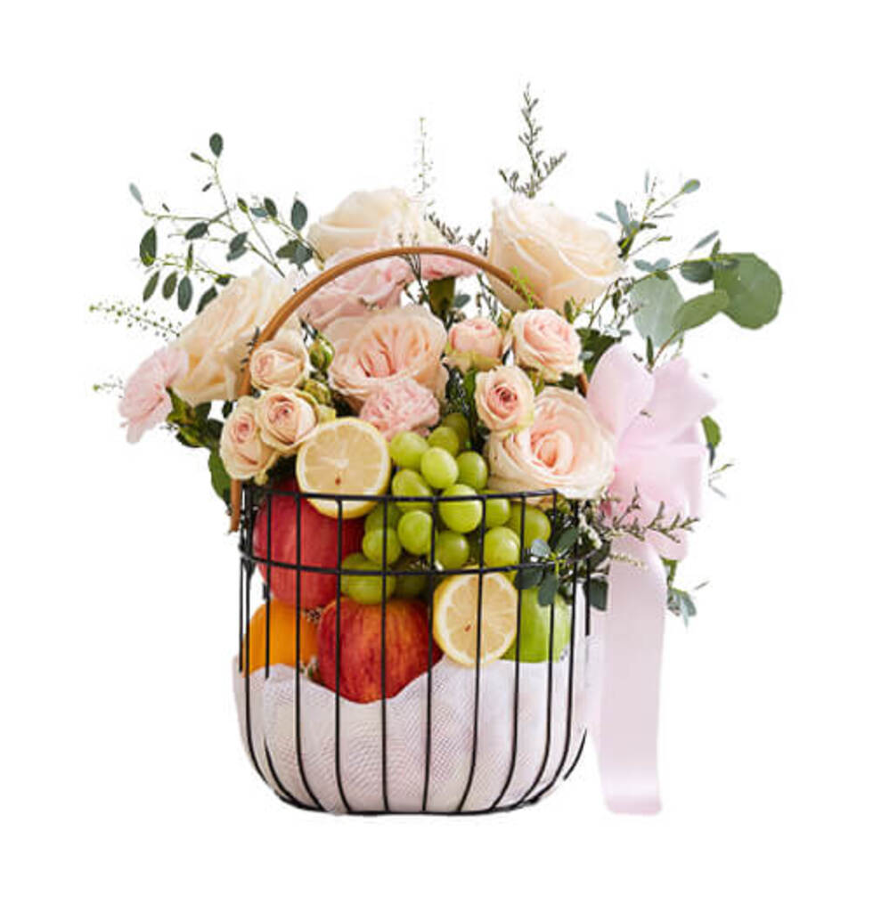 A bunch of pink exotic flowers and a basket full ...