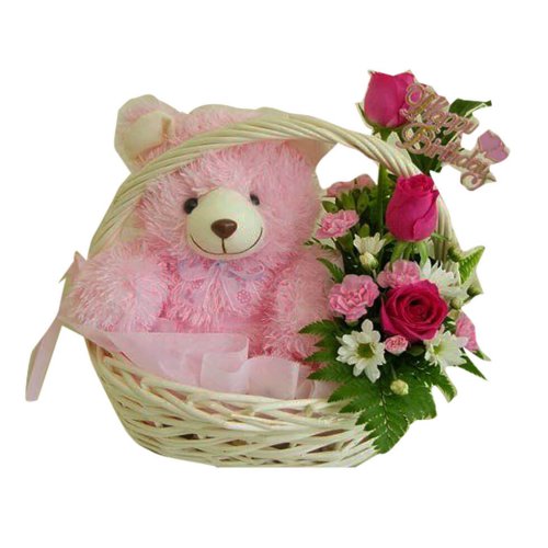 A Pink Teddy With A Bunch Of Roses