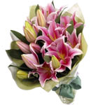 A beautiful bunch of pink oriental lilies, wrapped...