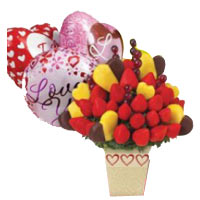 Magnificent Arrangement of Chocolate Coated Strawberries and Pineapples in a Ceramic Pot