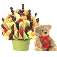 Breathtaking Arrangement of Rich Fruits with A Teddy Bear
