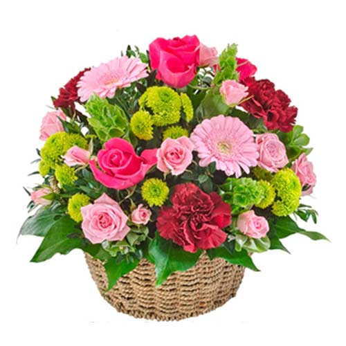 Cherished Arrangement of Mixed Flowers in a Basket<br/>