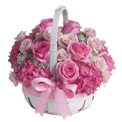Presented in a glass vase full of pretty flowers i......  to Ras Al Khaimah