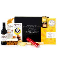 Order this Classy Well Seasoned Gift Hamper of Ass......  to Bude