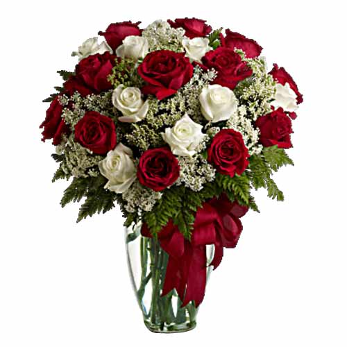 Give this eye-catching floral arrangement of 24 go......  to Ruwais