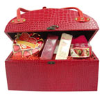 This beautiful mock croc box in the shape of a han......  to Umm Al Quwain