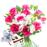 Impressive Bouquet of Roses and Freesia with Chocolate Gift Pack