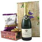 This Champagne Chocolates Nuts Gift Hamper contain...