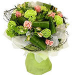 Make someone smile with this charming bouquet of pink roses perfectly arranged w...