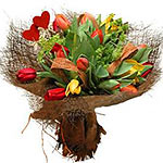 Cool, Crispy and gorgeous, this stylish bouquet is composed of red, yellow and o...