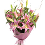 Brings a smile on anyones face by sending this beautiful bouquet of pink lilies....