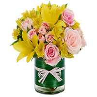 Charming Bouquet of 7 Pink Roses N 2 Yellow Lilies in a Vase