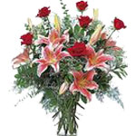 This elegant vased arrangement will catch their ey...