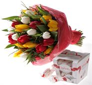Very nice spring bouquet of colorful tulips and Raffaello candies ...