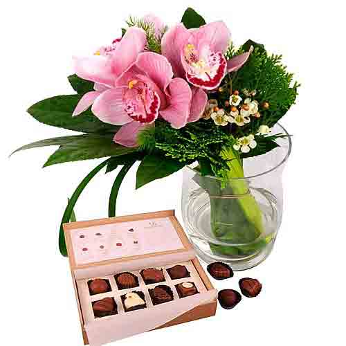 Indulge a friend with a box of chocolates and a po......  to Sungai siput
