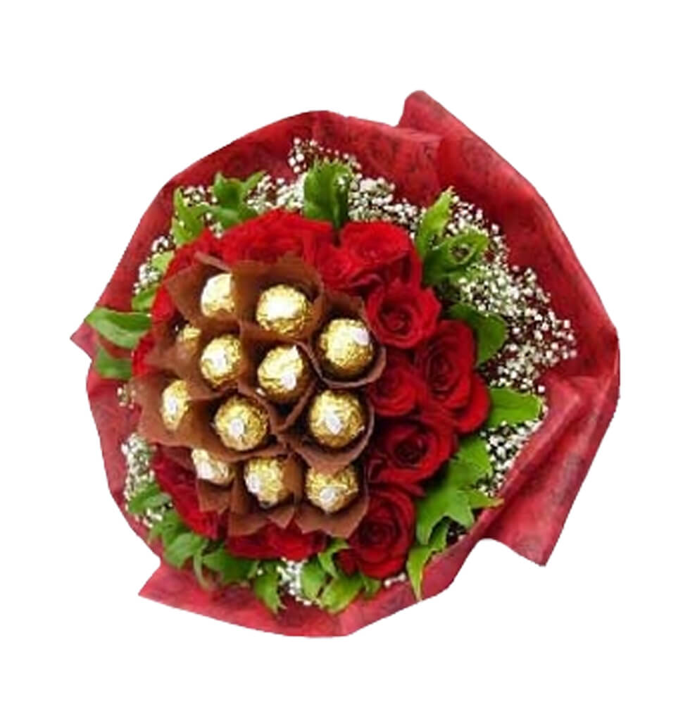 Stunning floral arrangements and a box of Ferrero ......  to Serdang