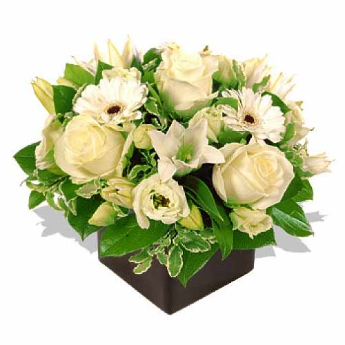 Mixed White Flowers in a Vase.......  to cebu_philippine.asp