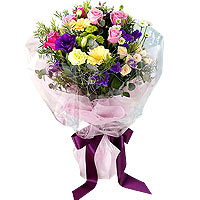 Fresh flowers in shades of deep purple and yellow ...