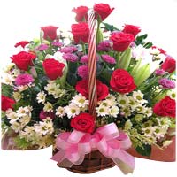 Roses with seasonal in basket