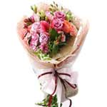 Long stem violet roses, stargazer lilies and greee...